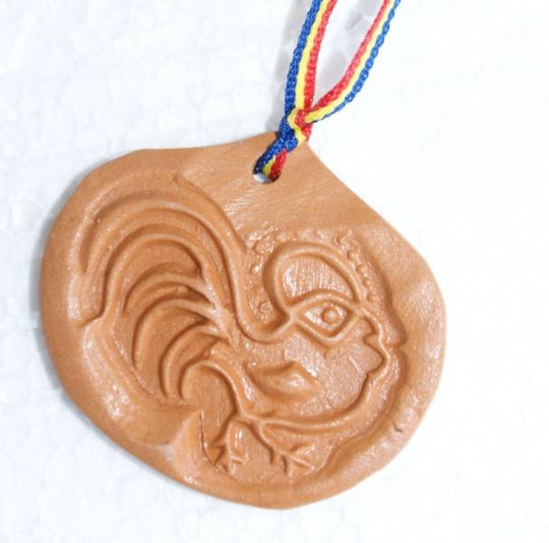 Cocosel - medalion traditional din ceramica de Horezu